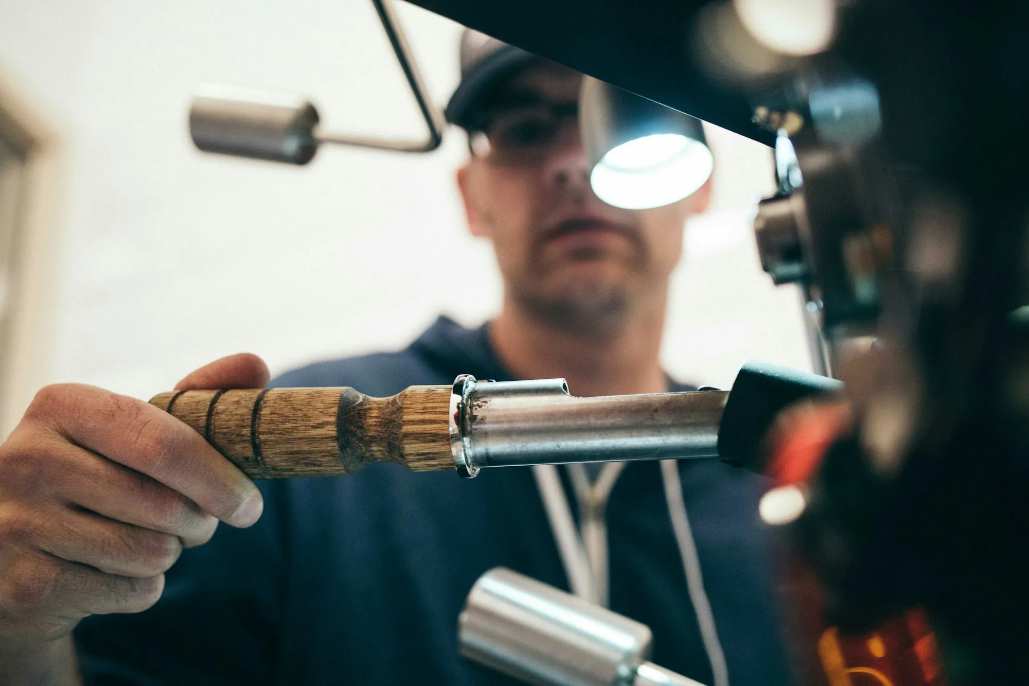 Technician using a soldering torch on a water line
